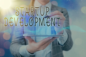 Handwriting text writing Startup Development. Conceptual photo developing idea which signifying...