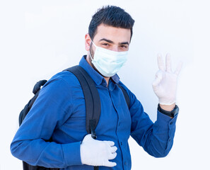Fototapeta na wymiar Arabic guy wearing healthy mask and smiling