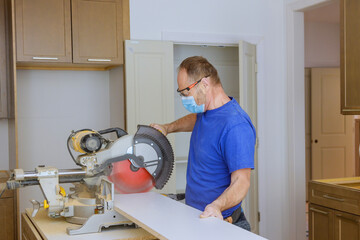 Obraz premium Kitchen remodel beautiful kitchen furniture the personal protective equipments for healthcare covid-19,