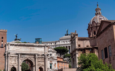 famous Septimius Severus triumph arch in front of St. Luca and Martina church domus, Rome Italy