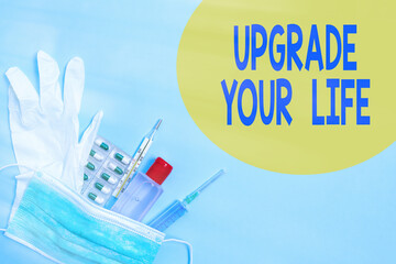 Writing note showing Upgrade Your Life. Business concept for improve your way of living Getting...