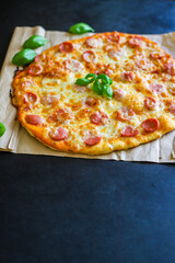 pizza salami sausages cheese fast food Takeaway Menu concept serving size. food background top view copy space for text organic healthy eating