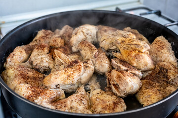 Tray filled with chicken to go to oven