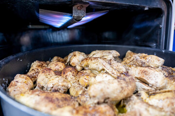 Tray filled with chicken to go to oven