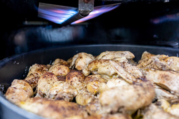 Tray filled with chicken to go to oven