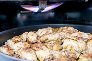 Tray filled with chicken to go to oven