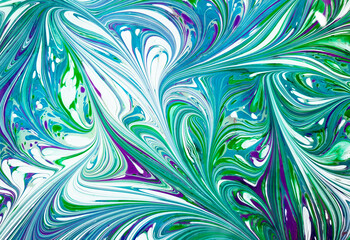 The background is painted in a variety of colors in the Ebru style