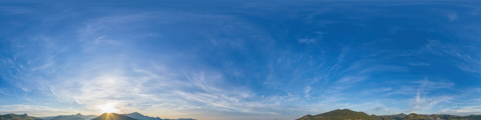 360 panorama sunrise sky with clouds, without ground for easy use in 3D graphics and panorama for composits in aerial and ground spherical panoramas as a sky dome. © panophotograph