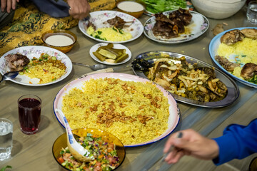 Arabic family gathering eating ramadan iftar