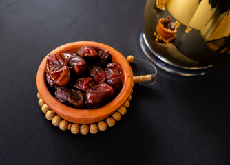 Coffee cups with some date and pot