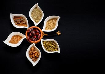 White plates contains some ingredients for eid sweets