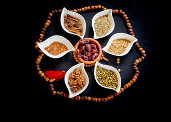White plates contains some ingredients for eid sweets