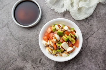 Home made avocado and tomato salad with fresh mozzarella and balsamic glaze  