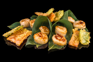 Aromatic mussels saint Jacques with reflection, isolated on black background