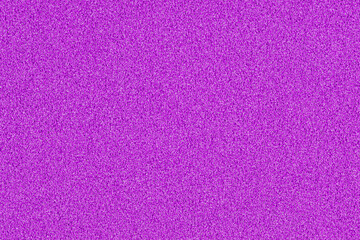 A macro photo of a purple gradient color with texture from real foam sponge paper for background, backdrop or design.
