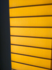 yellow wall with light