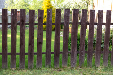 A wooden fence in the village.