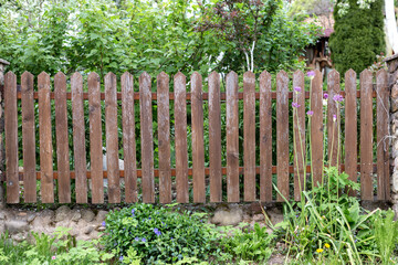 A wooden fence in the village.