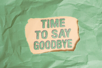 Writing note showing Time To Say Goodbye. Business concept for Farewell Parting Sendoff Departure Exit Leavetaking Green crumpled colored paper sheet torn colorful background