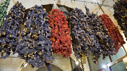 Hanged delicious colorful and sun dried marinated Turkish tomatoes, peppers and eggplants or...