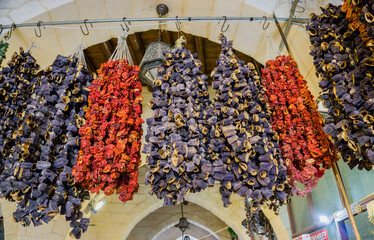 Hanged delicious colorful and sun dried marinated Turkish tomatoes, peppers and eggplants or...