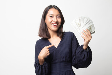 Portrait of  young asian woman  showing bunch of money banknotes.