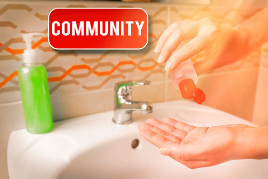 Conceptual hand writing showing Community. Concept meaning group of showing with a common characteristics living together Handwashing procedures for minimizing bacterial growth