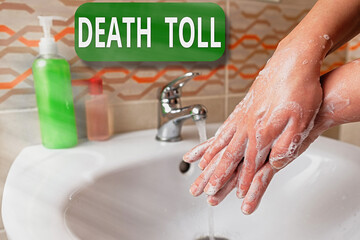 Word writing text Death Toll. Business photo showcasing the number of deaths resulting from a...