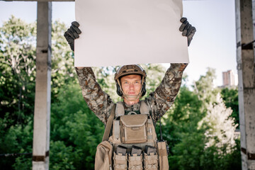 Protesting military with a placard