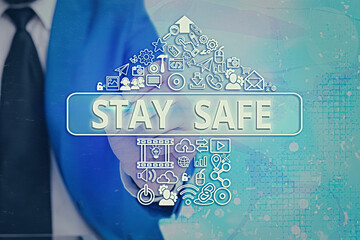 Handwriting text writing Stay Safe. Conceptual photo secure from threat of danger, harm or place to...