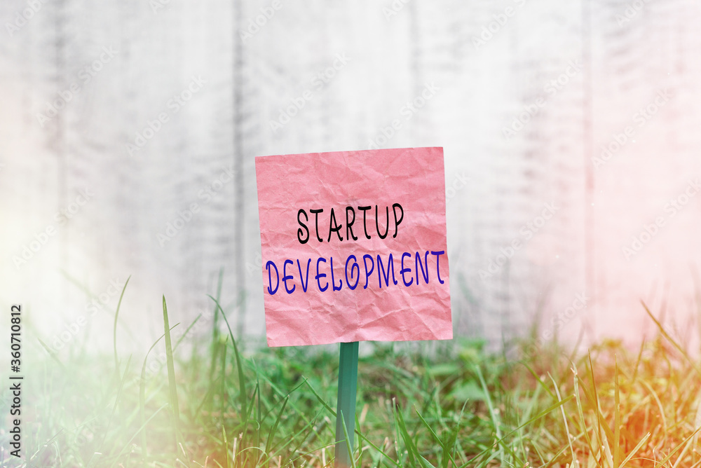 Poster conceptual hand writing showing startup development. concept meaning developing idea which signifyin