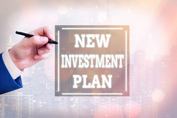 Conceptual hand writing showing New Investment Plan. Concept meaning financial goals and objectives...