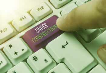 Text sign showing Under Construction. Business photo text building that is unfinished but actively...