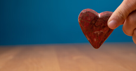 show heart love in hand