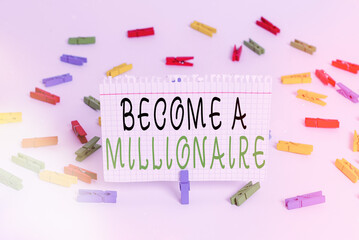 Writing note showing Become A Millionaire. Business concept for Aspiring to be a business tycoon...