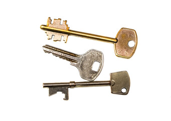 keys to apartment locks on a white background