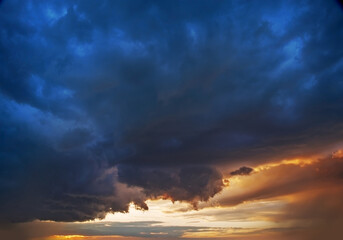 Powerful Cumulus clouds at sunset