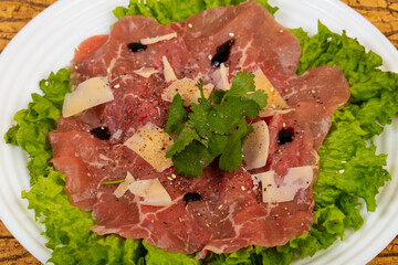 Beef carpaccio with parmesan cheese