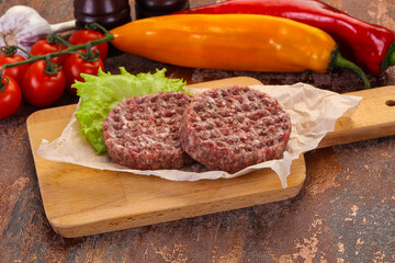Raw burger cutlet