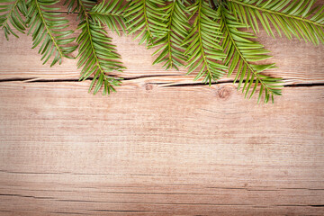 Fresh green fir branch, pine, fir-tree. Christmas background, New Year Vintage decoration on wood, wooden background, flat lay, close up, copy space for text, wallpapers