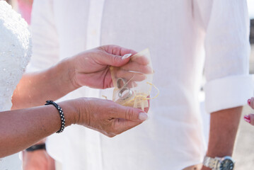 Wedding engagement rings in hands
