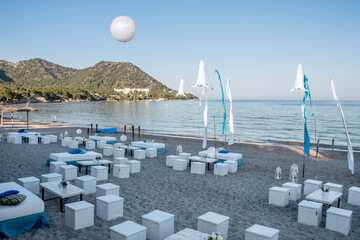 Beachfront wedding party decoration with blue sky