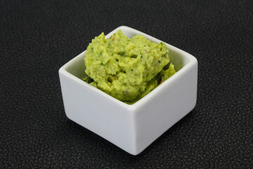 Avocado guacamole sauce with chili pepper