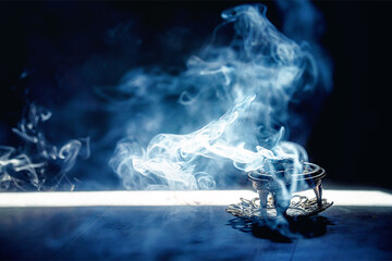 decorated incense with burning carbon and resins.