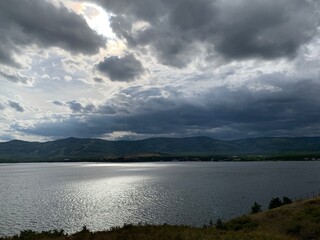 Dramatic sky. Sunset. Panoramic view. A group of clouds in the sky