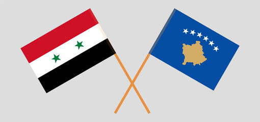 Crossed flags of Kosovo and Syria