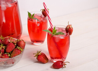 Summer cool drink with strawberries and ice.