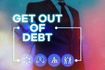Writing note showing Get Out Of Debt. Business concept for changing spending habit Learn to budget Prioritizing debts