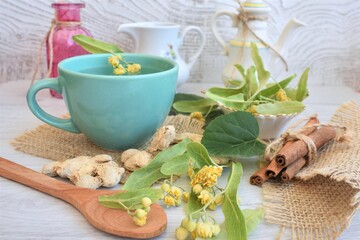 A cup of linden tea, cinnamon and ginger
