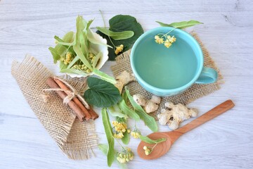 A cup of linden tea, cinnamon and ginger